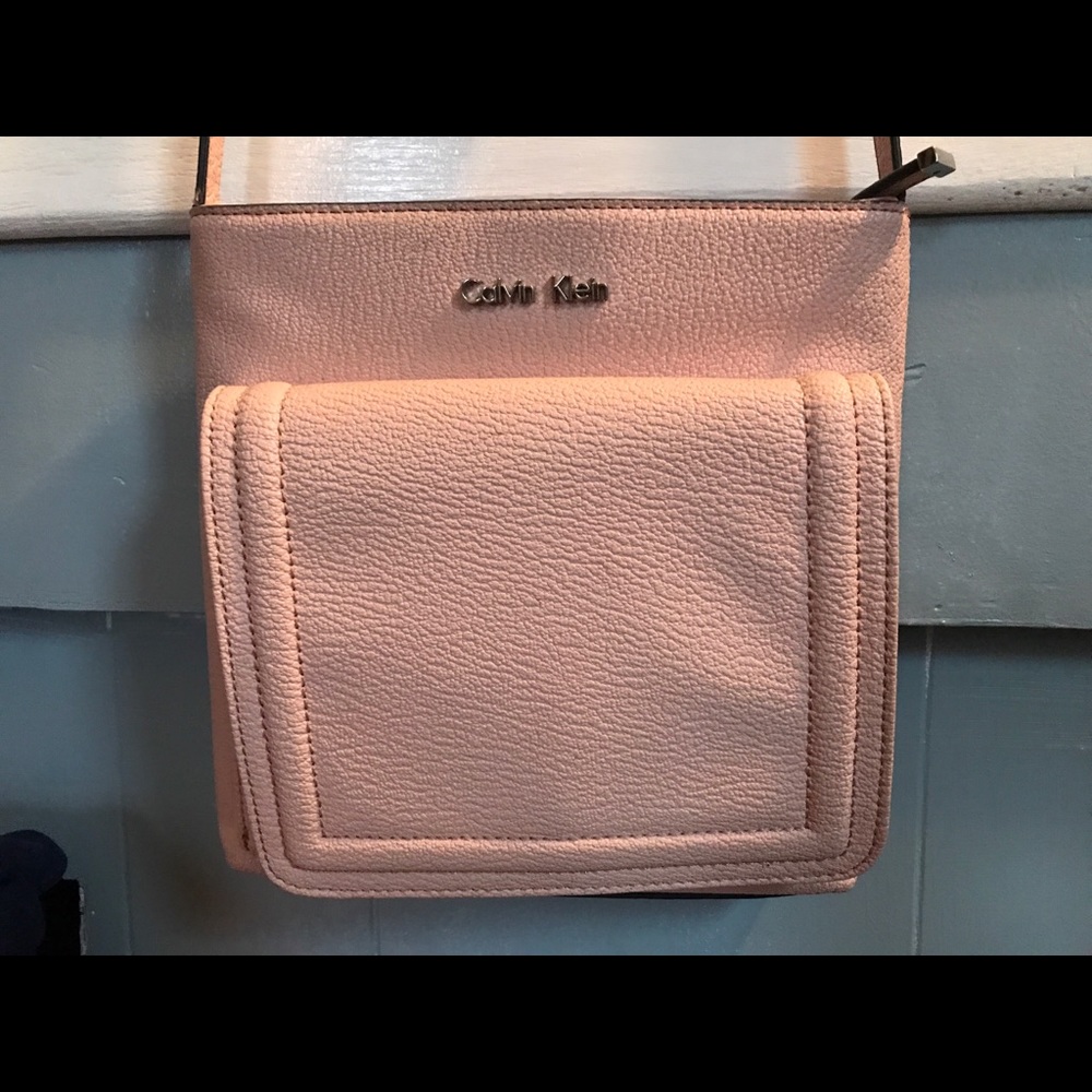 Calvin Klein genuine leather.